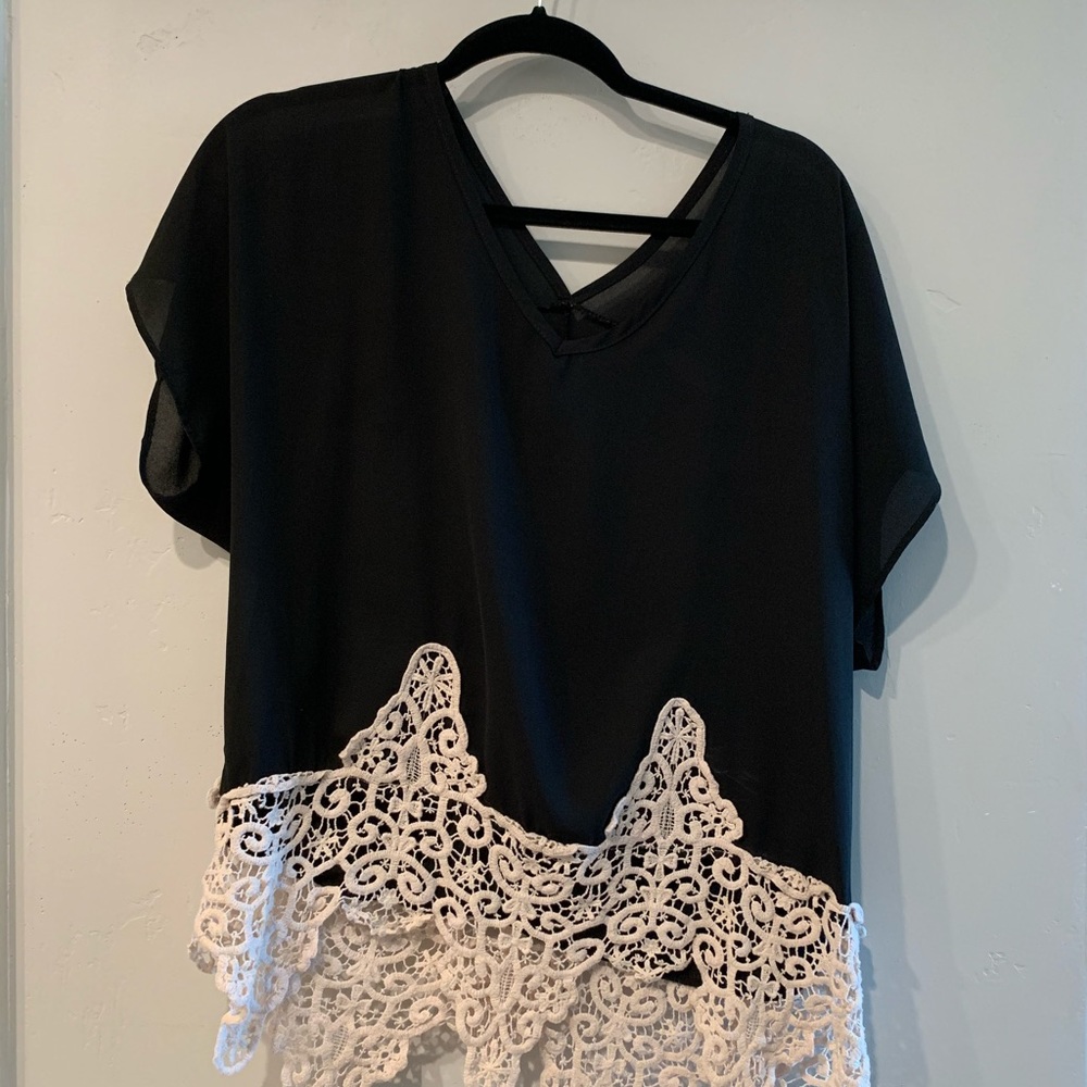 Black Blouse with white lace.